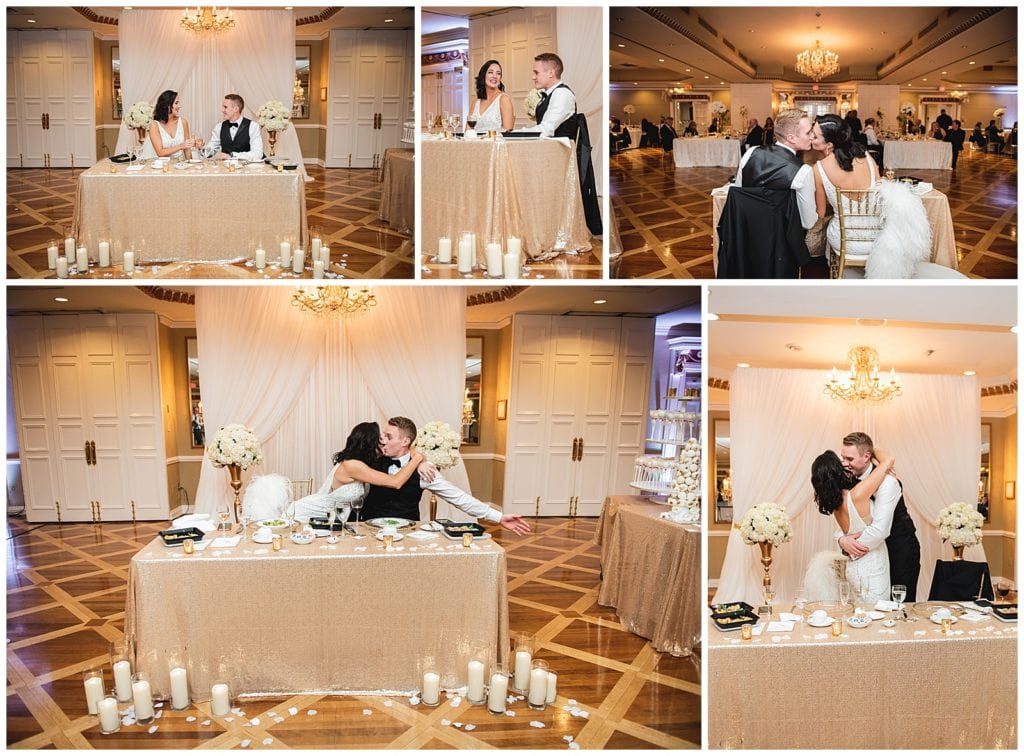 Couple staying connected at Sweetheart Table Kissing